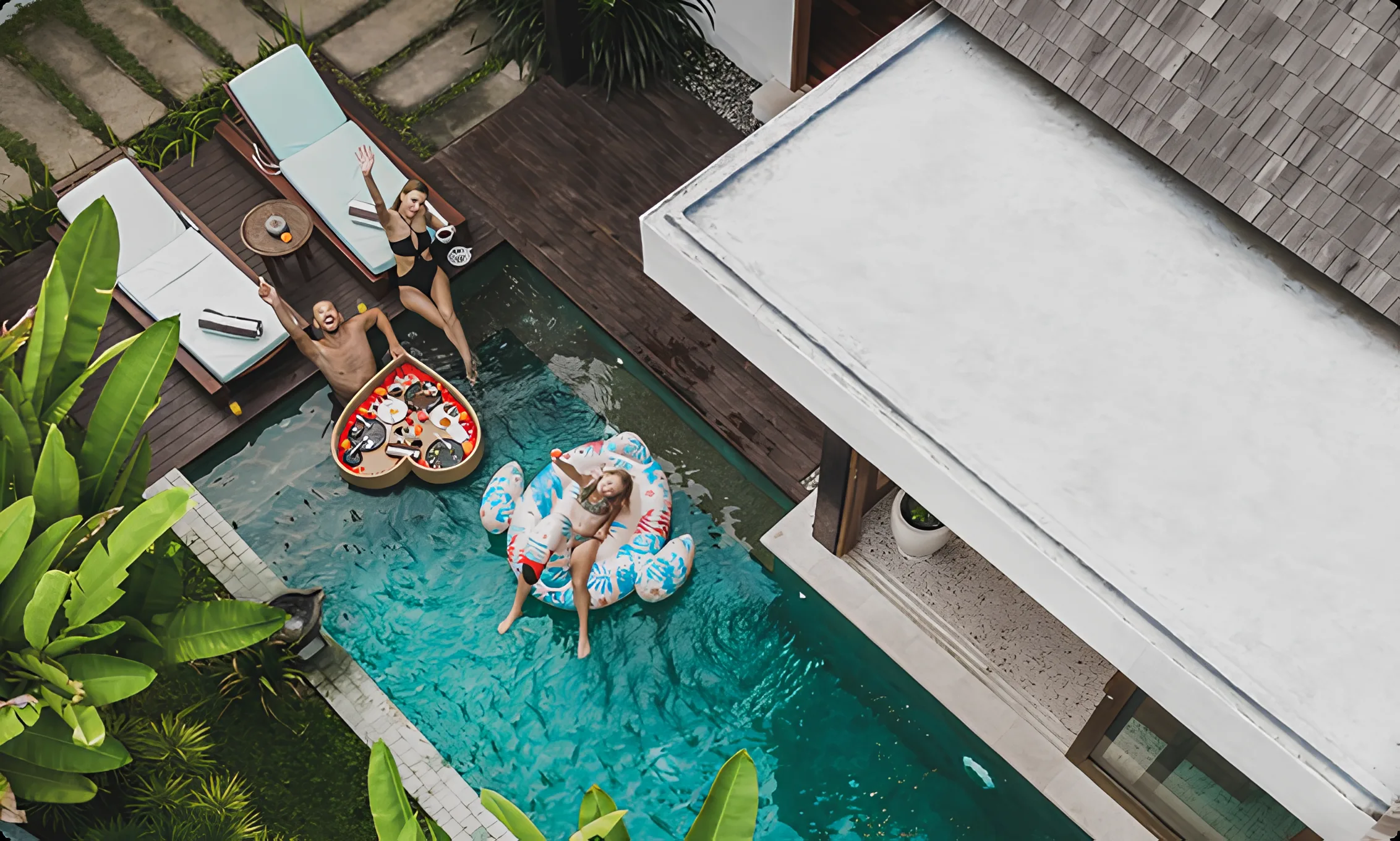 Aerial view of a floating breakfast in the pool